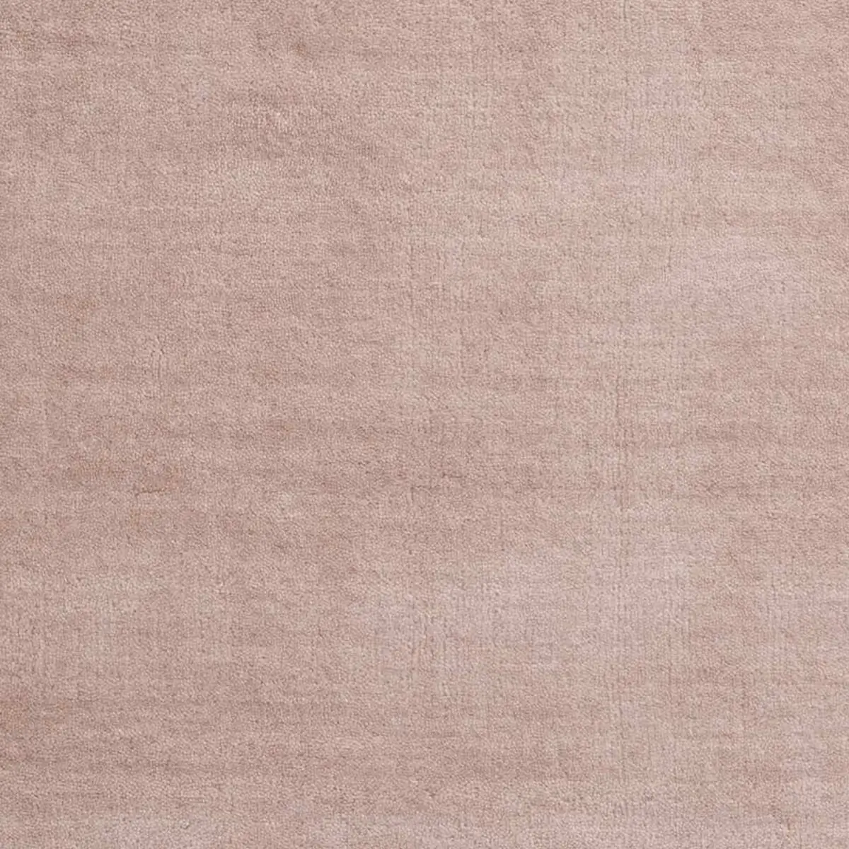 Nahaufnahme des Massimo Copenhagen Earth Bamboo Teppichs in Nougat Rose mit feiner Oberflächenstruktur und dezenten roséfarbenen Nuancen.