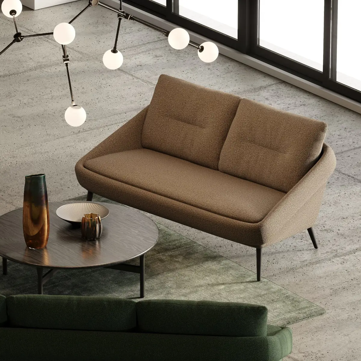 Braunes Noti Nome Sofa 2-Sitzer mit gepolsterten Rückenkissen und schlanken Beinen in einer modernen Lounge