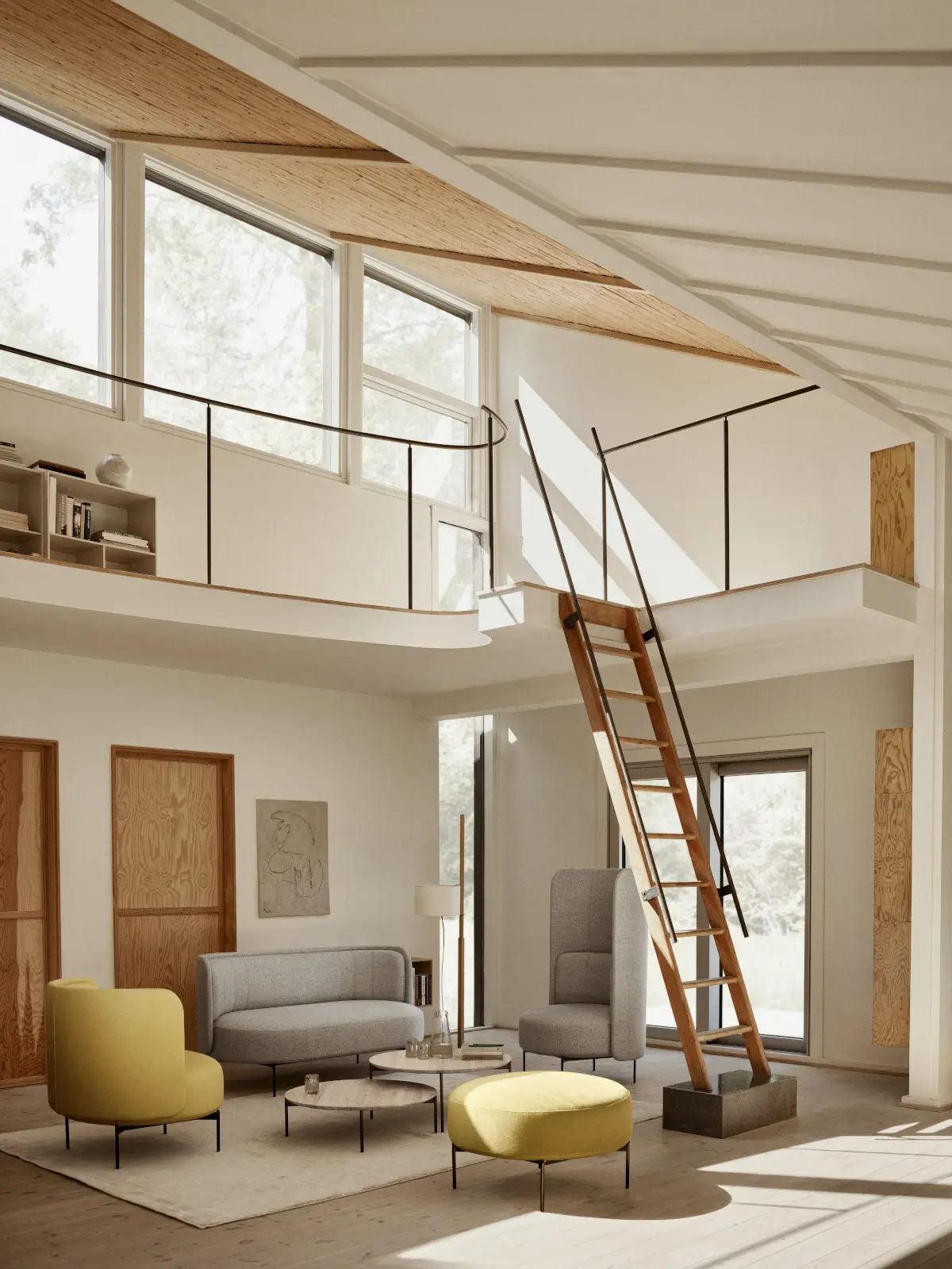 Softline Joe Hocker Small in Gelb in einem hellen Wohnambiente mit passenden Softline Sitzmöbeln, Couchtischen und moderner Galerie.