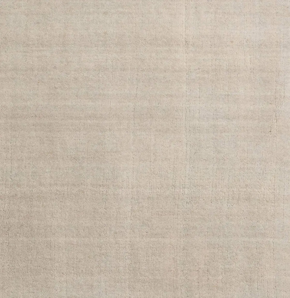 Nahaufnahme des Massimo Copenhagen Earth Bamboo Teppichs in Soft Grey mit feiner, leicht melierter Oberfläche und dezenten Farbnuancen in hellem Grau.